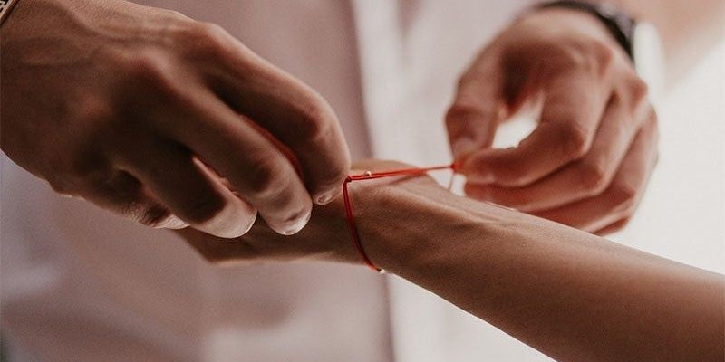 red string on right wrist where to wear red string bracelet