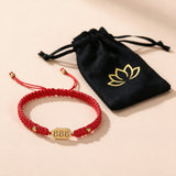 888 Angel Number Bracelet with the black lotus drawstring pouch it arrives in