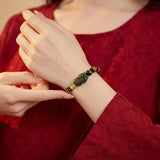 Tri-Color Tiger’s Eye Pixiu Wealth Bracelet