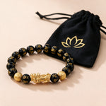 Feng Shui Pixiu black obsidian bracelet with the black lotus drawstring pouch it arrives in