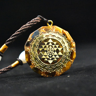 Sacred Sri Yantra Orgonite Necklace - Tiger’s Eye - Buddha & Karma